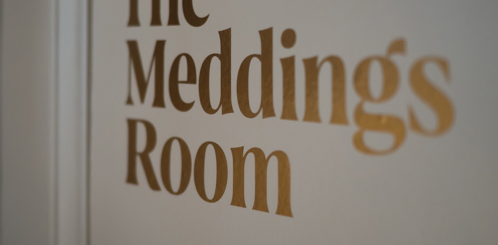 1805 Rooms gold signage